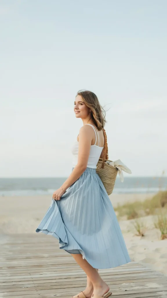 Sky Blue Pleated Midi Skirt With A White Camisole