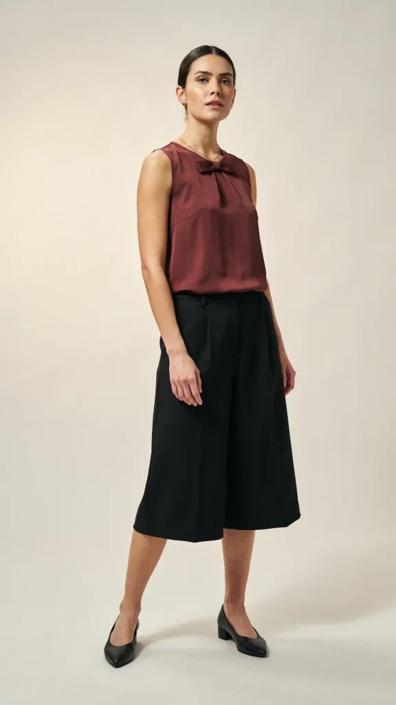 Black-Pleated-Culottes-with-Burgundy-Sleeveless-Bow-Blouse Black Pleated Culottes with Burgundy Sleeveless Bow Blouse